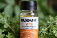 Close-up view of natural vitamins for men supplement label